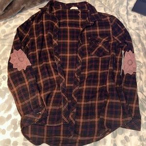 brown and navy blue flannel with cute patches on the elbows